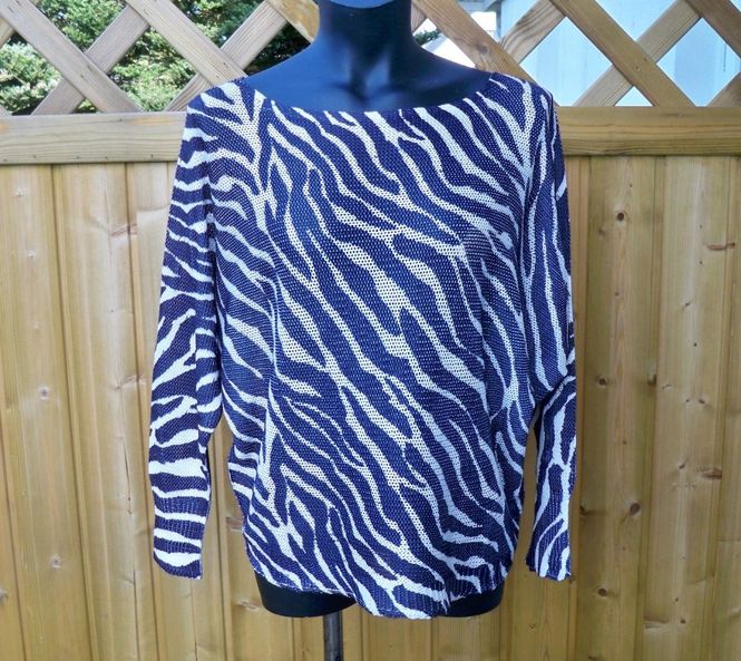 Huvudbild Stickad tröja Zebra