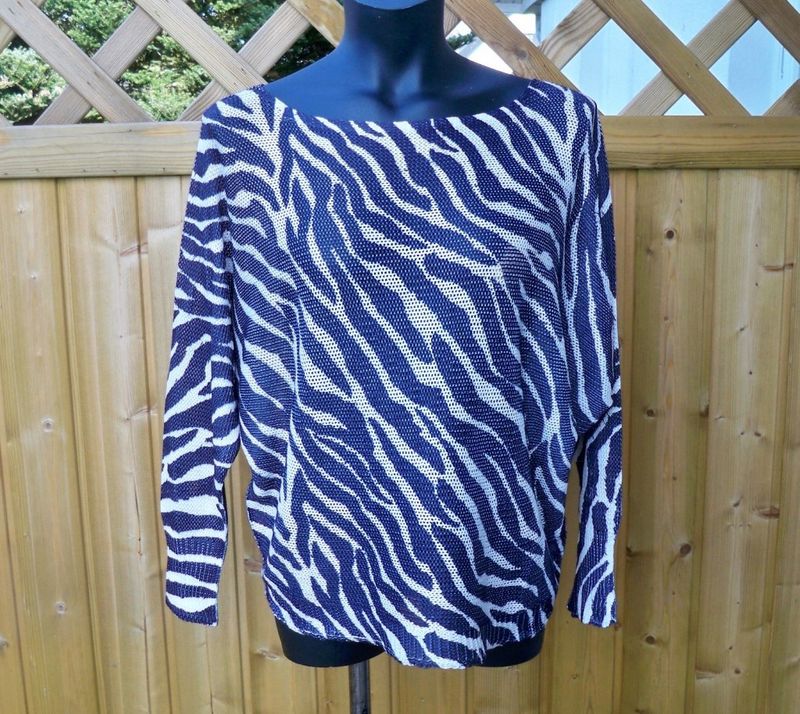 Stickad tröja Zebra